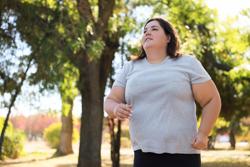 Woman jogging outdoors as part of a weight loss journey with Mounjaro in Ireland